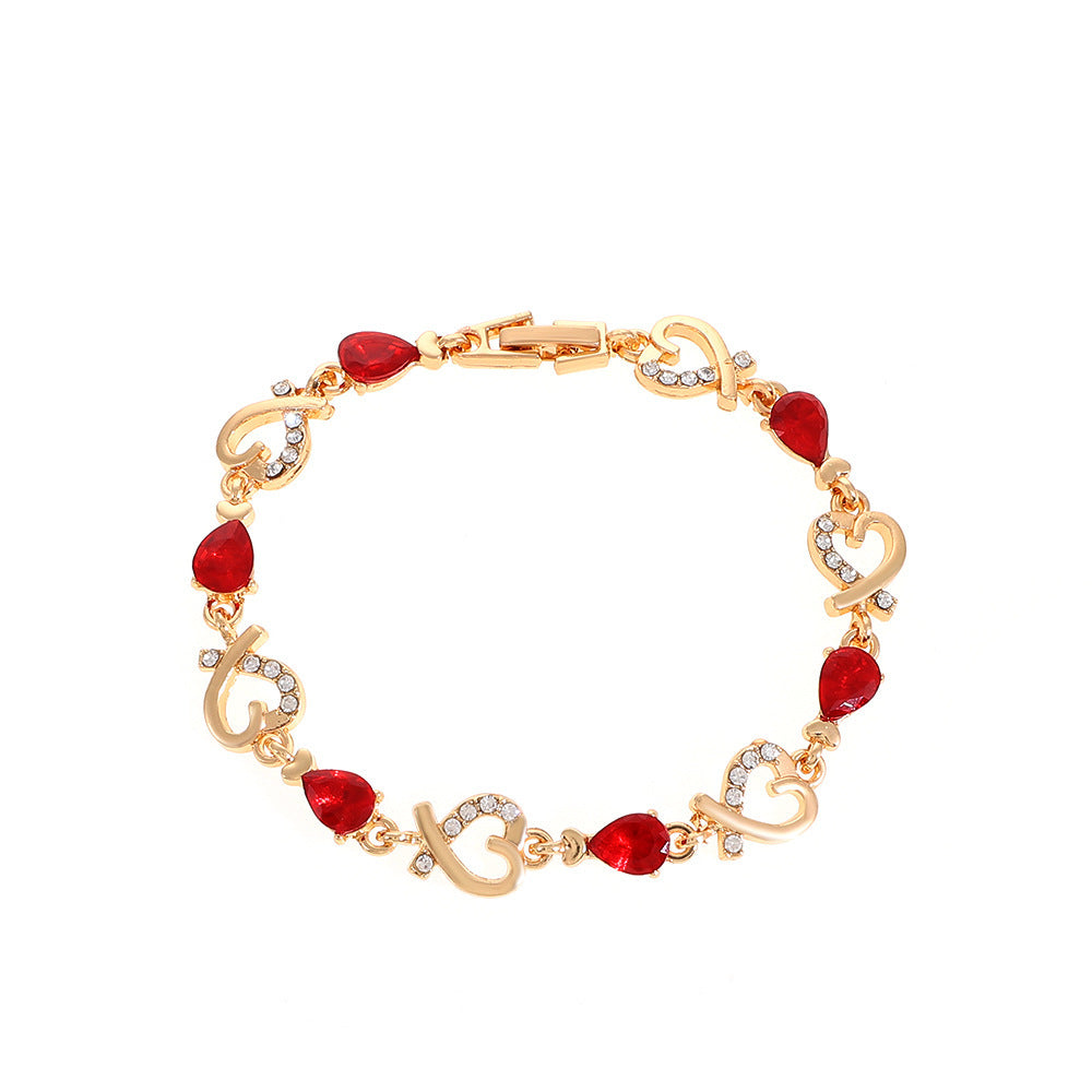 Pulsera de aleación de diamantes de flor hueca de corazón al por mayor